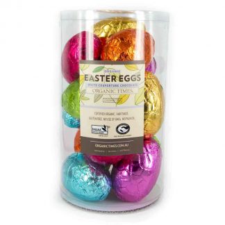 A tub of Organic Times 70 gram White Chocolate Easter Eggs.